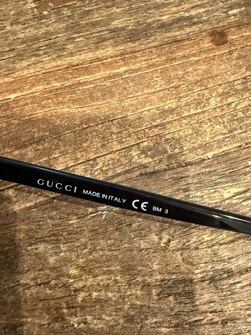 Gucci Black Cat-Eye Sunglasses with Dark Lenses